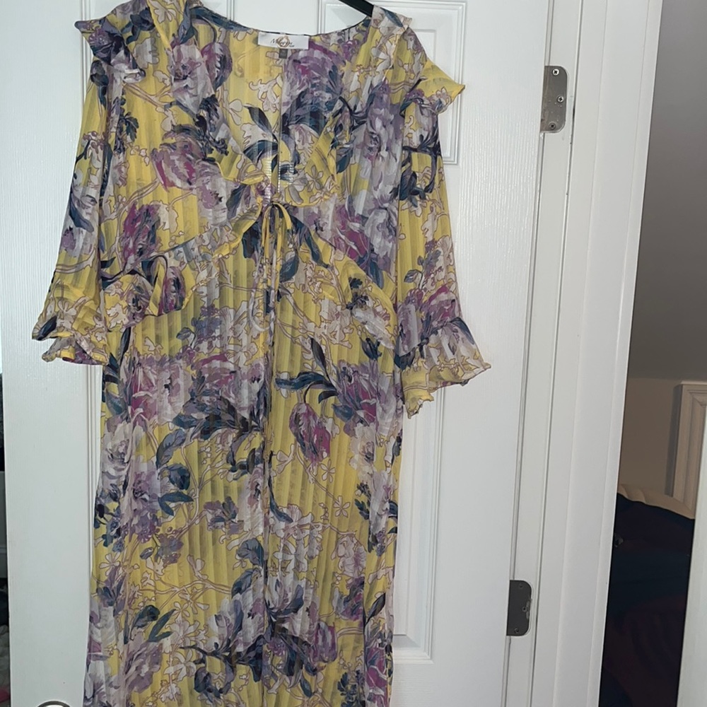 Yellow floral dress ties in the front